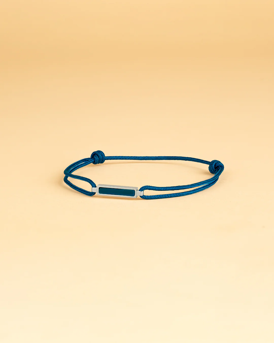 Blue nylon bracelet with a Blue Tiger Eye stone element