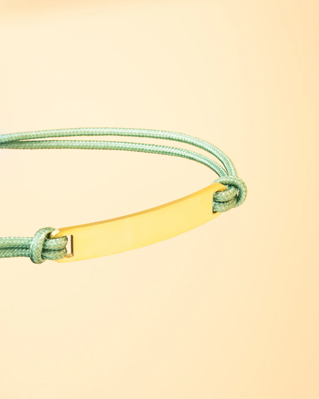 Green nylon bracelet with a gold-plated engraving plate - Image 2