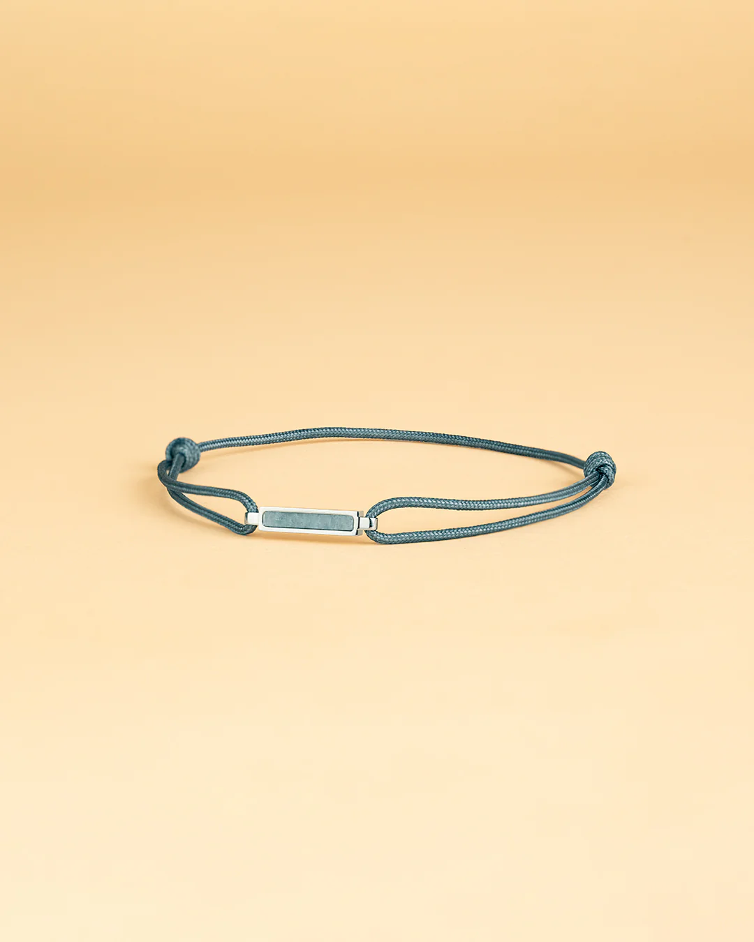 Grey nylon bracelet with a Larvikite stone element