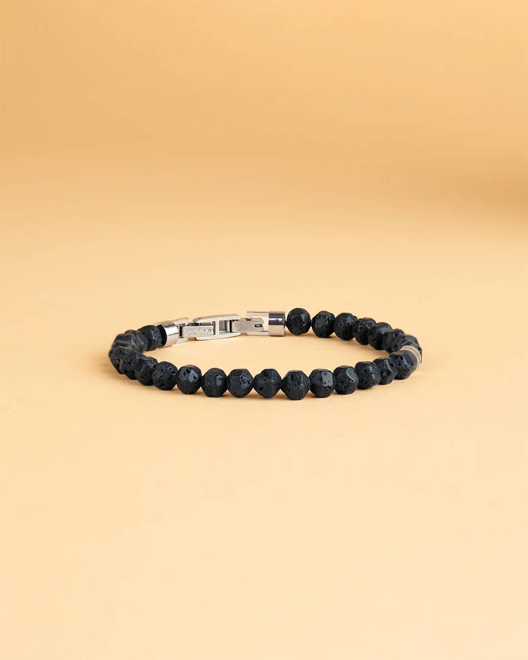 Bracelet with 6mm black Lava stone and titanium element