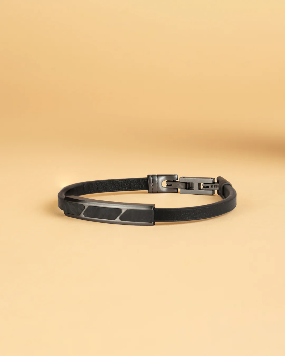Black leather bracelet finished with forged carbon