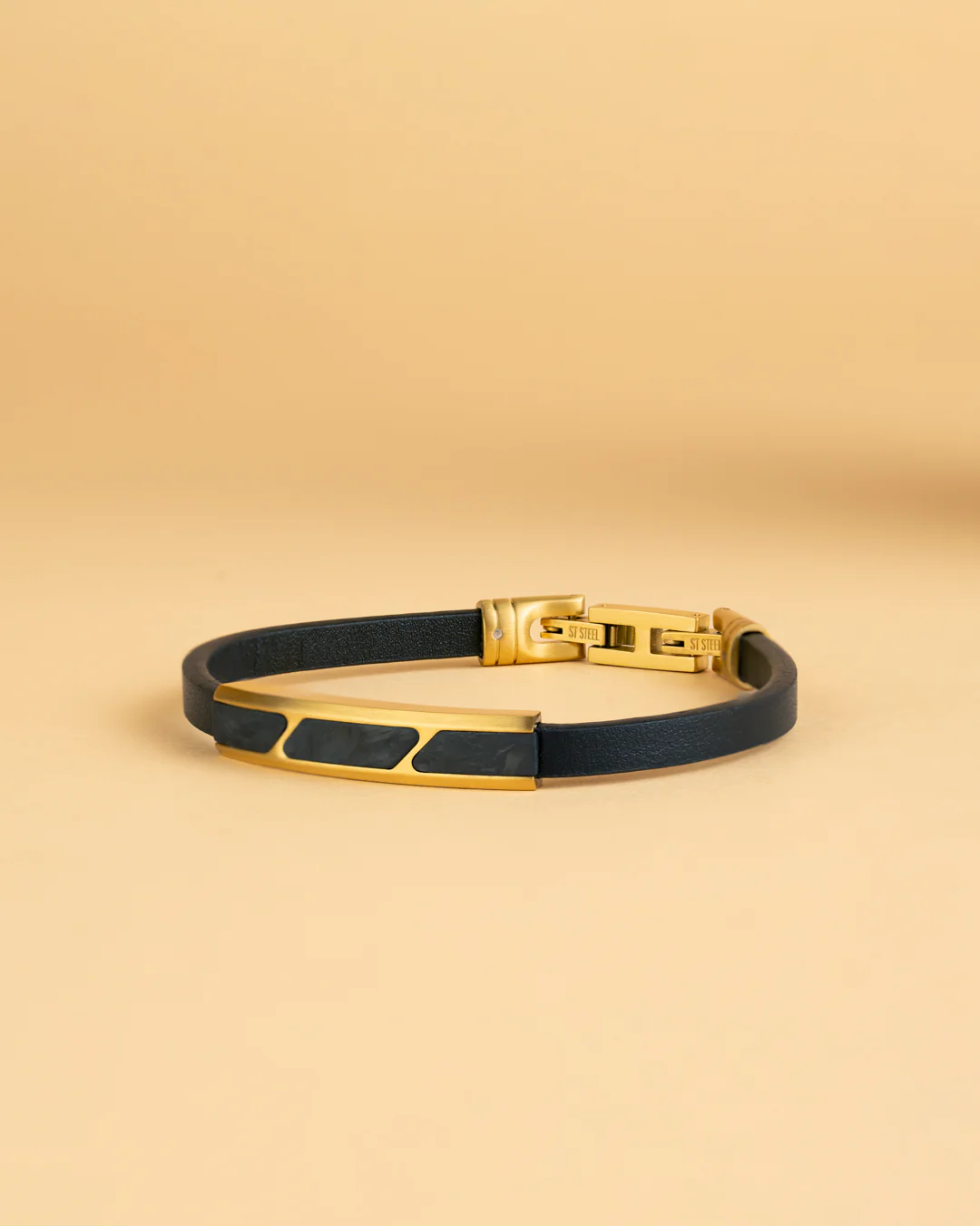 Black leather bracelet with gold-plated forged carbon